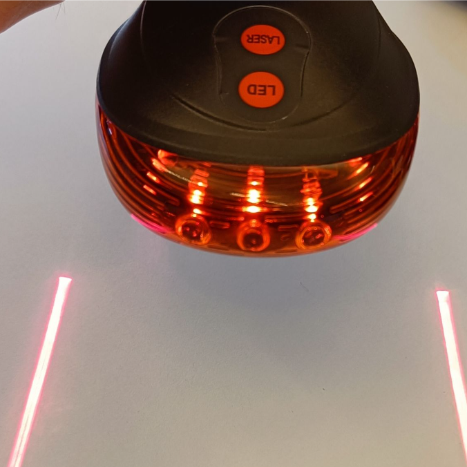 Säkerhets ljus med laserstrålar
